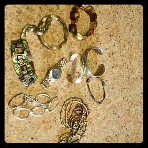 15 bracelets and one watch